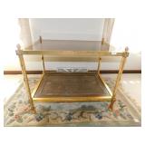 GOLD FINISH GLASS INSET AND CANED BASE TABLE