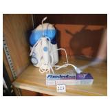 FIXODENT AND WATER PIK