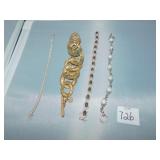 FOUR BRACELTS INCL. LARGE GOLD TONE LINKS