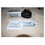 BROOKSTONE SELF SETTING CLOCK & AUDIOVOX CLOCK