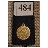 18K GOLD PENDANT WITH SUN DESIGN ON FRONT