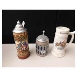 STEINS; GOEBEL BLUE & GRAY WITH CRACK ON BOTTOM,