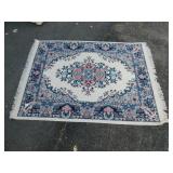 RUG WITH BLUE, CREAM. AND PINK COLORS. VERY
