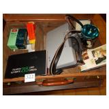 LEATHER BRIEFCASE WITH VINTAGE POLAROID CAMERA,