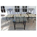 4 WROUGHT IRON CHAIRS WITH GLASS TOP END TABLE