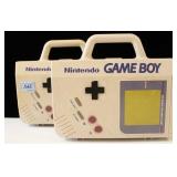 2 GAME BOYS IN PLASTIC CARRYING CASES WITH GAMES