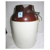 10" BROWN AND WHITE STORAGE CROCK W/BALE