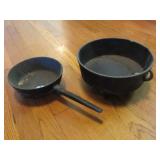 CAST IRON FOOTED SAUCE PAN AND CAST IRON DUTCH