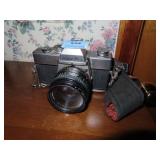 VINTAGE MINOLTA SRT-11 35MM CAMERA WITH