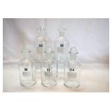 FIVE WHEATON LAB BOTTLES
