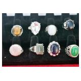 EIGHT ASSORTED RINGS