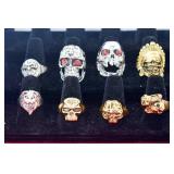 EIGHT ASSORTED RINGS