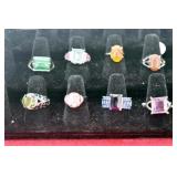 EIGHT ASSORTED RINGS