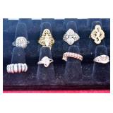 EIGHT ASSORTED RINGS