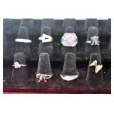 EIGHT ASSORTED RINGS