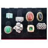 EIGHT ASSORTED RINGS
