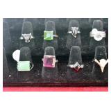 EIGHT ASSORTED RINGS