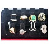 EIGHT ASSORTED RINGS