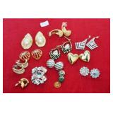 TWELVE PAIR PIERCED EARRINGS