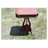 ACCENT TABLE WITH CARVED BASE