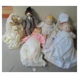 5 BABY DOLLS AND 2 CLOWN DOLLS