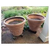 2 PLASTIC FLOWER POTS WITH ROLLERS