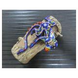 BEADED LIZARD ON CERAMIC LOG