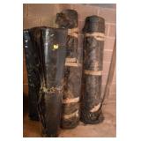 FOUR ROLLS BLACK PLASTIC