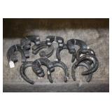 TWELVE SETS HORSESHOES