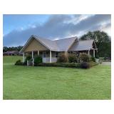 +/- 0.57 acre - House and detached garage