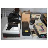 ASSORTED VINTAGE MOVIE CAMERAS AND SUPPLIES