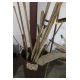 TRASH CAN AND ASSORTED HAND TOOLS, PRY BAR, RAKE,