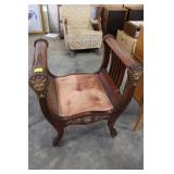 ANTIQUE NORTH WIND CARVED CHAIR