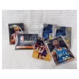 4 PACKS OF BASKETBALL TRADING CARDS