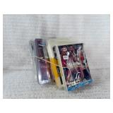 10 CELOPHANE PACKS OF BASKETBALL CARDS