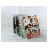 10 CELOPHANE PACKS OF FOOTBALL CARDS