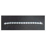 18CT GENUINE BLUE TOPAZ BRACELET