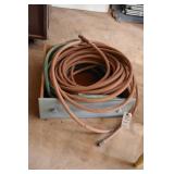 2 LENGHTS OF GARDEN HOSE