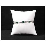 OVAL CUT LAB CREATED EMERALD TENNIS BRACLET