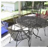 WROUGHT IRON PATIO TABLE AND 4 CHAIRS