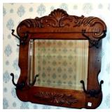 OAK HALL MIRROR WITH HAT HOOKS APPLIED CARVINGS,