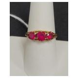 14K YELLOW GOLD AND 3 RED STONES RING