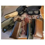 COLLECTION OF EYE GLASSES AND CASES