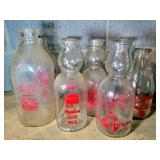 9 ASSORTED GLASS MILK BOTTLES