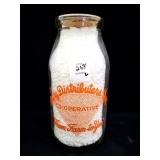 DAIRY DIST. INC. QUART GLASS MILK BOTTLE