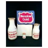 MEADOW GOLD GLASS MILK BOTTLES AND UNIFORM