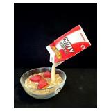 PET MILK ADVERTISING - MILK POURING INTO BOWL OF