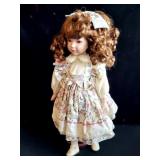 COLLECTIBLE BABY DOLL WITH STAND
