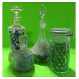 4 JARS OF MARBLES