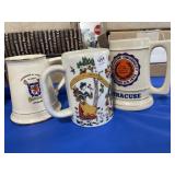 3 CERAMIC MUGS:  GERMAN, UNIVERSITY OF SANTIAGO,